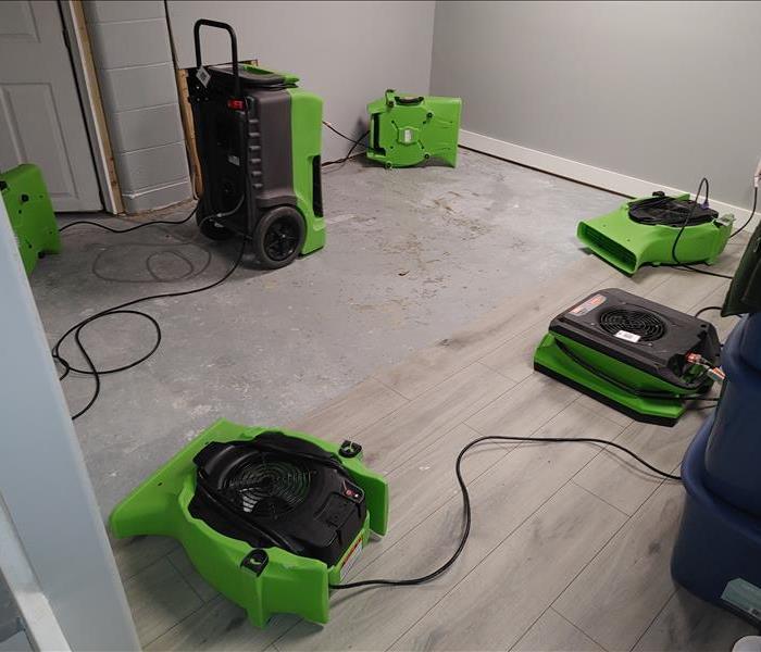 Basement with drying fans after flood