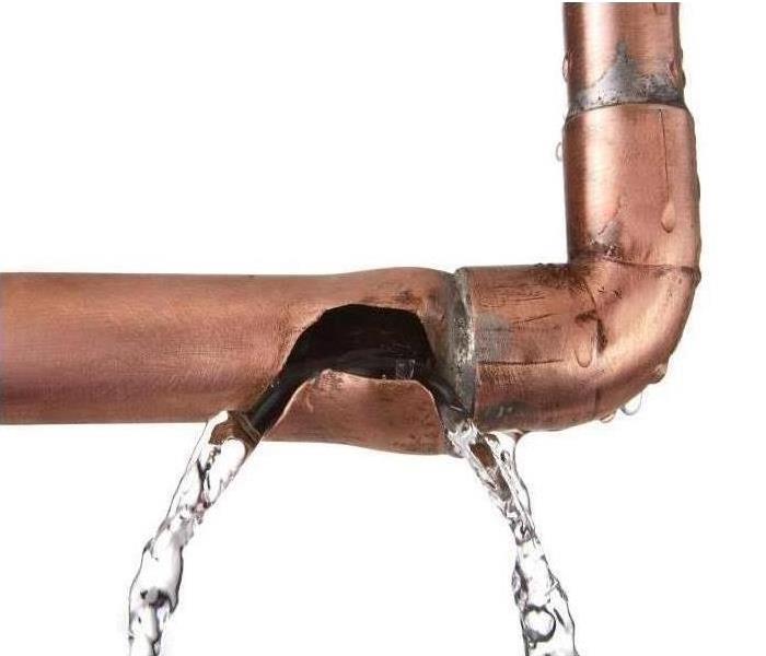 Picture of broken pipe with water coming out
